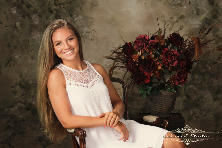 Senior girl with painted background